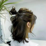 How to tie up half-tied hair
